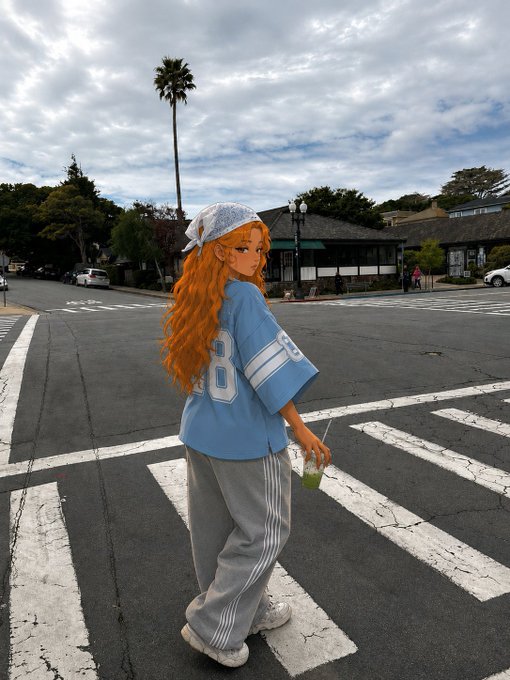 An anime-style orange-haired girl in a blue jersey and gray sweatpants stands on a crosswalk holding a drink.