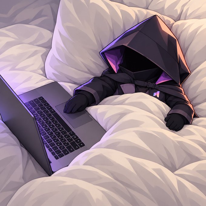 An anime-style illustration depicts a small, dark, cloaked character lying in bed under blankets while using a grey laptop.