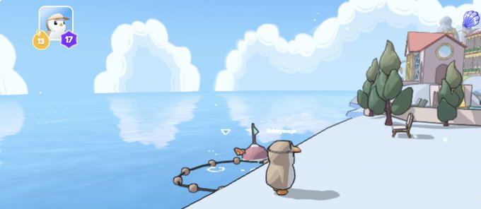 A cute penguin character stands on a snowy shoreline beside fishing rods, with a tranquil ocean and distant clouds in the background. The HUD shows a level "13" and "17" badges, perfectly illustrating the post about enjoying a peaceful fishing day in Pudgy World while struggling to catch new fish.