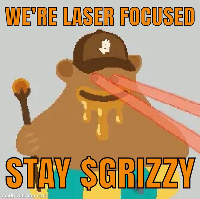 The image features a cartoon bear wearing a brown hat, holding an orange stick with a red laser beam coming out of it. The caption below the bear reads "We're re laser focused Stay $GRIZZY @BITCOIN_GRIZZY #Runes @Relentless_btc @BitcoinNL @huuep".