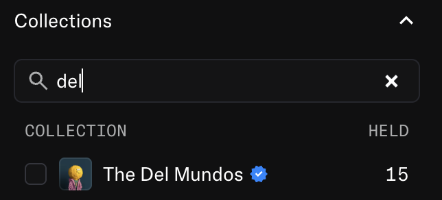 NFT collections search interface showing a search for "del" with one result: "The Del Mundos" verified collection holding 15 items.