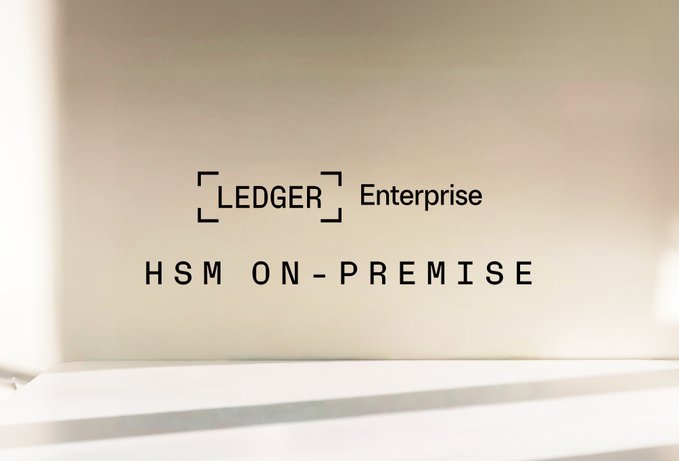 A minimalist image with the text 'LEDGER Enterprise' and 'HSM ON-PREMISE' displayed on a light surface.