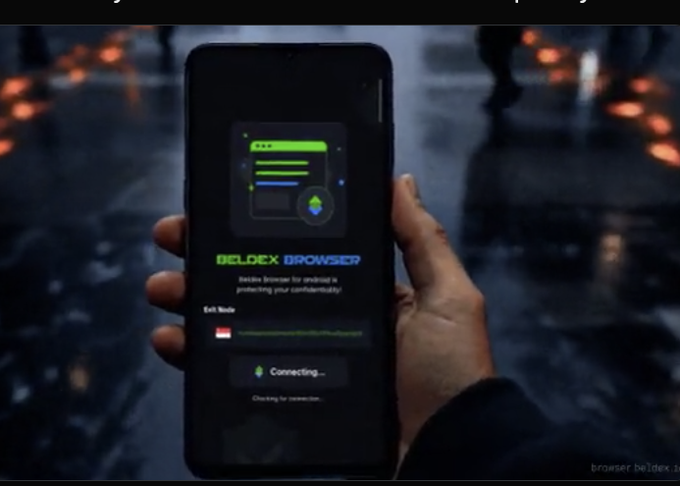 Hand holding a smartphone displaying the 'BELDEX BROWSER' VPN app interface with 'Connecting...' status visible against a dark, blurred background.