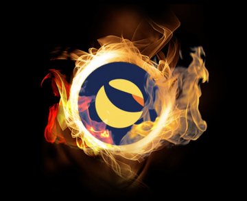 A burning logo featuring a blue circle with a yellow crescent and red detail, engulfed in orange flames against a dark background.