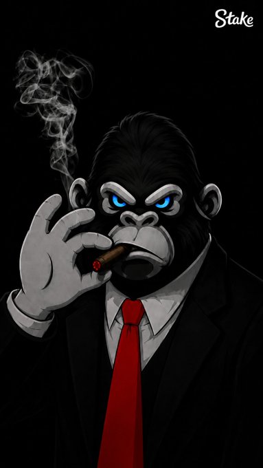 A cartoon gorilla in a black suit and red tie smokes a cigar against a black background, with "Stake" branded in the top right corner. The image serves as a sleek, gambling-themed mascot graphic to promote the live streaming event and Stake username giveaway mentioned in the post.