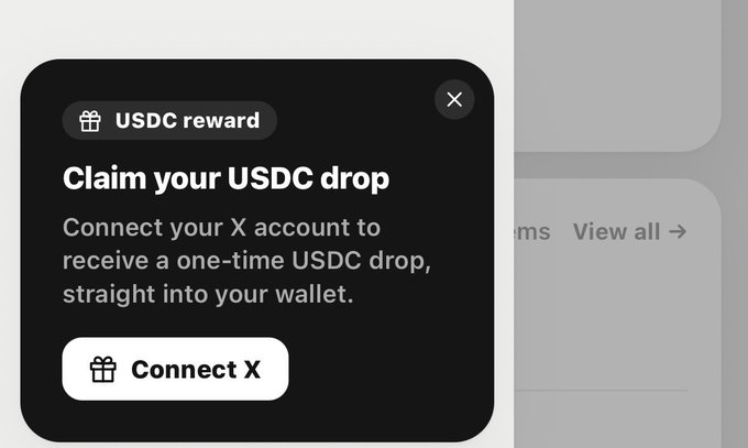 A dark popup modal reads 'USDC reward' and 'Claim your USDC drop,' prompting the user to connect their X account to receive a one-time USDC airdrop.