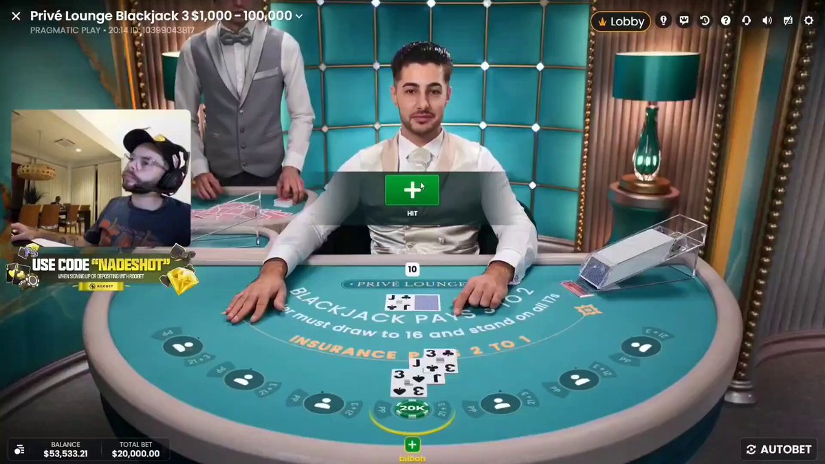 The image shows a man sitting at a table playing blackjack with a green card, while another person stands behind him. The player has just lost his bet of 20K and is now waiting for his next hand. A green card is being drawn from the deck, and the player's hands are ready to receive it.
