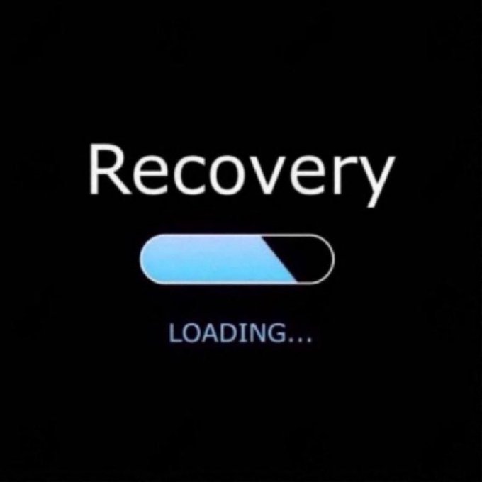 Mobile app loading screen on a black background displaying the word 'Recovery' above a partially filled blue progress bar with 'LOADING...' text beneath it.