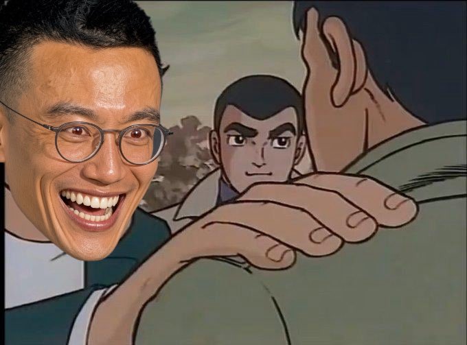 An edited anime-style image showing a real man's smiling face with glasses photoshopped onto a cartoon character, placing his hand on another character's shoulder.