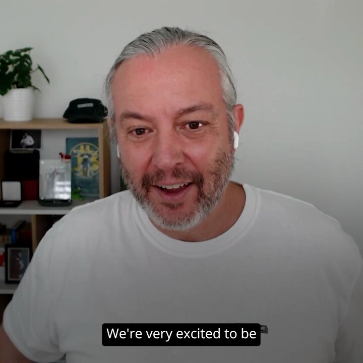The image shows a man wearing a white t-shirt with black text. The caption of the image reads "Let's say your customer wants to pay in USDC, but your Treasury wants to hold RLUSD - @bettermoney_co 's clearinghouse service will be able to handle that conversion at par directly within". This message is related to a post about cryptocurrency and how it can be used for payments.