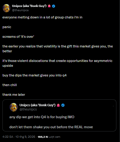 A tweet screenshot from 'Unipcs (aka 'Bonk Guy')' @theunipcs advising followers not to panic during market dips, stating 'buy the dips the market gives you into q4' and calling volatility 'the gift this market gives you.'