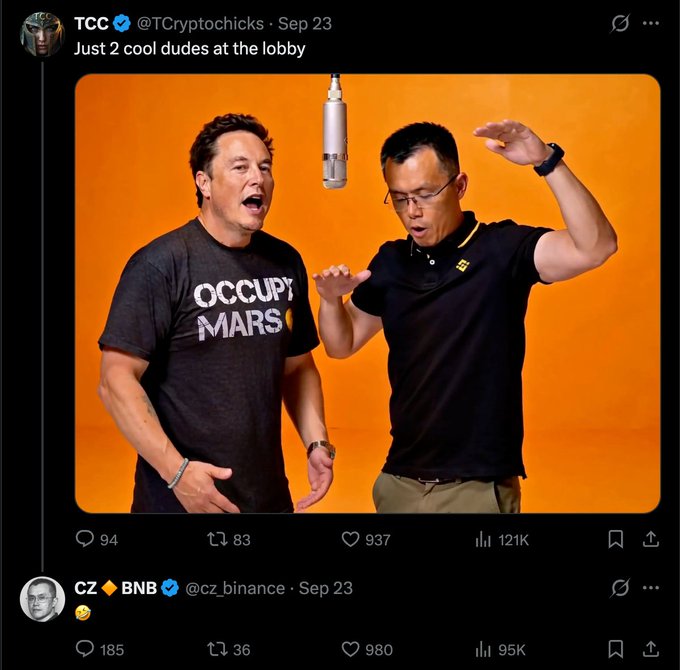 A screenshot of two Twitter/X posts showing an image of Elon Musk wearing an 'OCCUPY MARS' t-shirt and Binance CEO Changpeng Zhao dancing under a microphone, posted by @TCryptochicks and replied to by @cz_binance.
