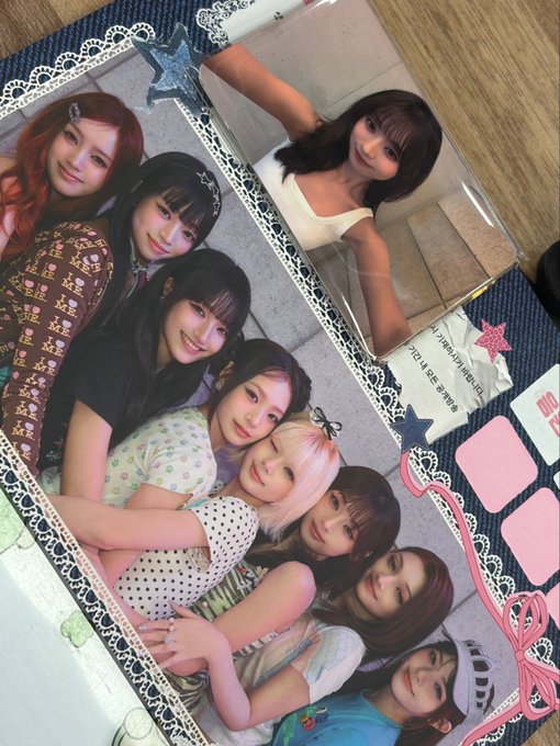 A group of young women pose together in a scrapbook-style photocard featuring decorative lace borders, pink accents, and text reading "2014 SUMMER," connecting to the caption "Unisheartㅜ" as a heartfelt expression of love for the group.