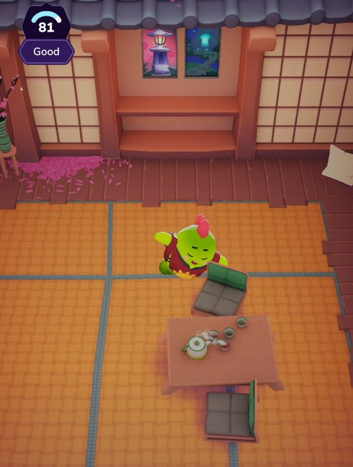 A screenshot from a video game showing a Japanese-style room with tatami mats, a green character with a red crest, and a 'Good 81' indicator in the corner.