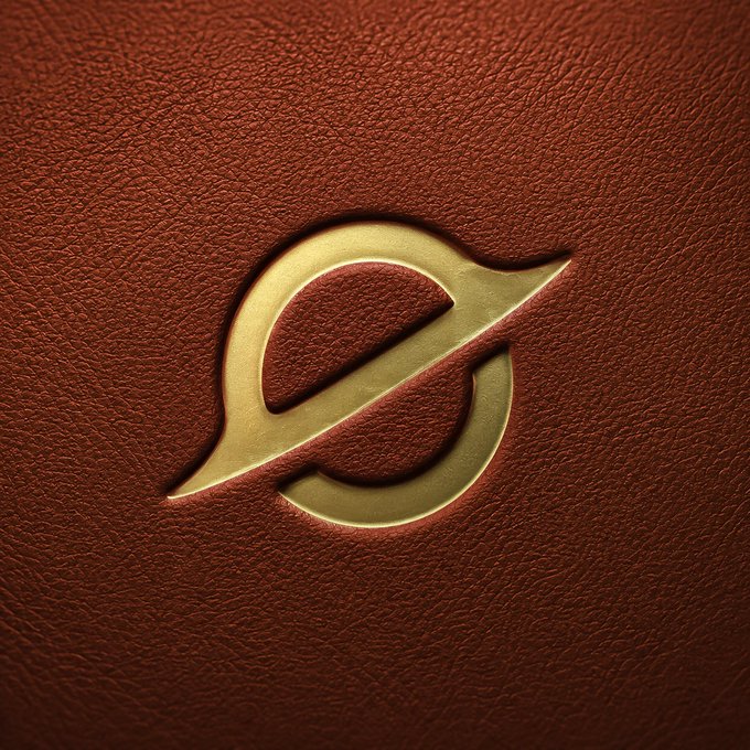 The image features a brown leather cover with a gold logo that reads "EVEDEX for real". This logo, which appears to be circular or oval-shaped, is prominently displayed against the background of the cover. The text "EVEDEX for real" is written in a larger font size than the rest of the image and is positioned at the bottom right corner of the cover.