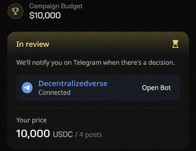 The image shows a cellphone displaying text with two different price points: $10,000 USDC and $1,000 USDC. The screen also has information about four posts being posted for $1 each, along with an open bot button next to them. The phone is located at the bottom of the post, indicating that it might be a review or discussion post related to campaign budgets in the cryptocurrency world.