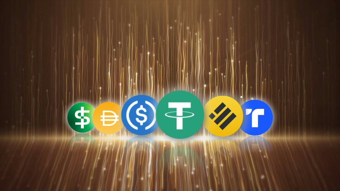 Six cryptocurrency logos—including Circle ($), DAI (€), USDC ($), Tether (T), Binance (B), and an unidentified token—are displayed in a row against a backdrop of sparkling gold light streaks, visually representing the diverse stablecoin ecosystem at the center of Brazil's regulatory push. The image ties directly to the article by symbolizing the key players the proposed legislation aims to govern.