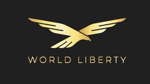A logo featuring a golden eagle with spread wings above the text 'WORLD LIBERTY' on a dark gray background.