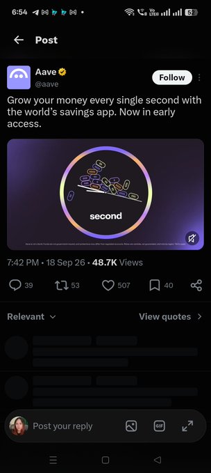 A screenshot of an X post by 'Aave @aave' reading 'Grow your money every single second with the world's savings app. Now in early access,' featuring an illustration of a clock with coins and the word 'second'.
