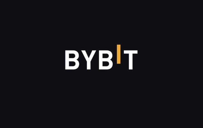 The image displays the Bybit logo on a black background, featuring the brand name "BYBIT" in bold white letters with a distinctive gold/orange vertical bar replacing the "I". This logo reinforces the accompanying post about Bybit's trading volume competition with a $100,000 prize pool for trading stock index-linked tokens.