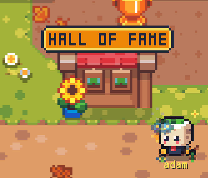 A pixel-art scene shows a character named "adam" standing outside a building labeled "HALL OF FAME," with a sunflower in a pot beside the entrance. The image illustrates the post's announcement of a new Hall of Fame leaderboard at the Kingdom, celebrating top players like Adam.