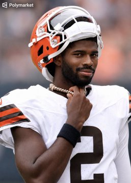 Shedeur Sanders (#2), wearing a Cleveland Browns helmet and jersey, looks on during practice. The image accompanies news that Sanders led all first-team QB reps with three touchdowns and no interceptions, while veteran Deshaun Watson still remains the favorite to start Week 1 on Polymarket (82%).