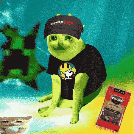 A green cat wearing a 'GameStop' cap and a black t-shirt sits against a turquoise background next to a copy of 'Jack Links' beef jerky.
