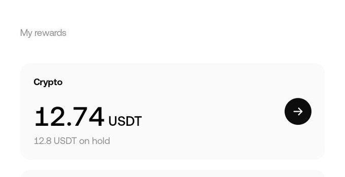 A "My rewards" dashboard screenshot showing 12.74 USDT earned in Crypto with 12.8 USDT on hold, which supports the post's claim of earning around $13 from an OKX campaign with just a $50 investment to complete the required tasks.