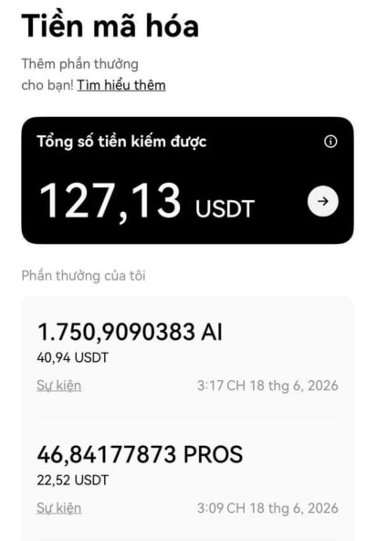 A Vietnamese-language OKX screenshot titled "Tiền mã hóa" (Crypto earnings) showing a total savings of **127.13 USDT**, with recent event rewards of **1.750909038 AI ($40.94 USDT)** at 3:17 PM and **46.84177873 PROS ($22.52 USDT)** at 3:09 PM on June 18, 2026—illustrating the user's crypto earnings from the OKX World Cup event mentioned in the post.