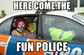 A Ronald McDonald clown sits in the back of a German Polizei (police) car with bold text reading "HERE COME THE FUN POLICE." The image humorously frames the clown as law enforcement, fitting the post's theme that impatient traders are like reckless clowns getting arrested by the market's "fun police" for overtrading, while patience and high-conviction trades keep you out of financial trouble.