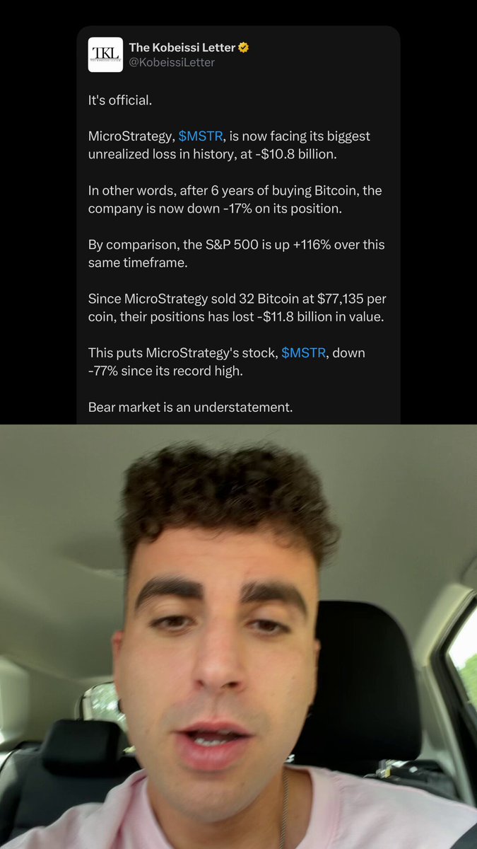 A man with curly hair wearing a pink shirt is sitting inside a car, looking at his phone screen. The screen displays an email from someone named Michael Saylor, who has written a letter about Bitcoin. The letter explains that he plans to sell $BTC (Bitcoin) and encourages people to invest in it.