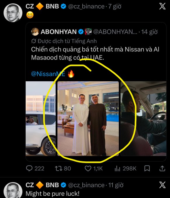 A Twitter/X screenshot showing CZ (Changpeng Zhao, @cz_binance) commenting on a Nissan UAE promotional tweet, with a yellow circle highlighting a photo of CZ with Al Masaood; his caption reads 'Might be pure luck!'.