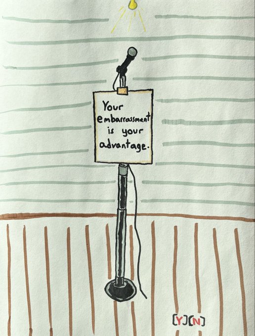 A hand-drawn illustration showing a microphone stand with a sign reading "Your embarrassment is your advantage" against a striped background, signed "YJ[N]".