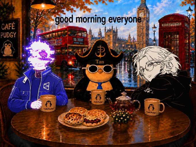 The image features three cartoon characters sitting at a table with cups of coffee, sandwiches, and pastries. The background shows a cityscape with buildings and a red double-decker bus. The caption reads "Good morning everyone", indicating that this is a greeting for all those who read the post.