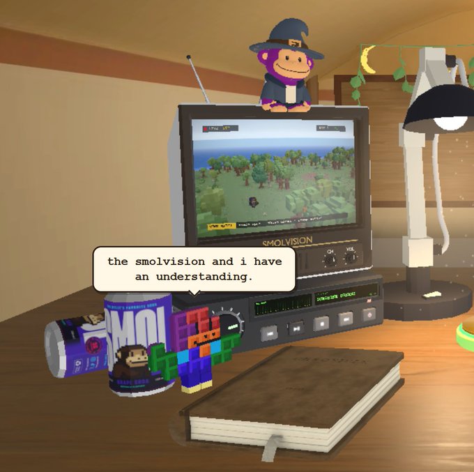 A 3D-rendered scene shows a retro TV displaying a video game, a monkey figure in a wizard hat perched on top, with a text bubble reading 'the smolvision and i have an understanding.' next to some Tetris blocks and a Smol soda can.