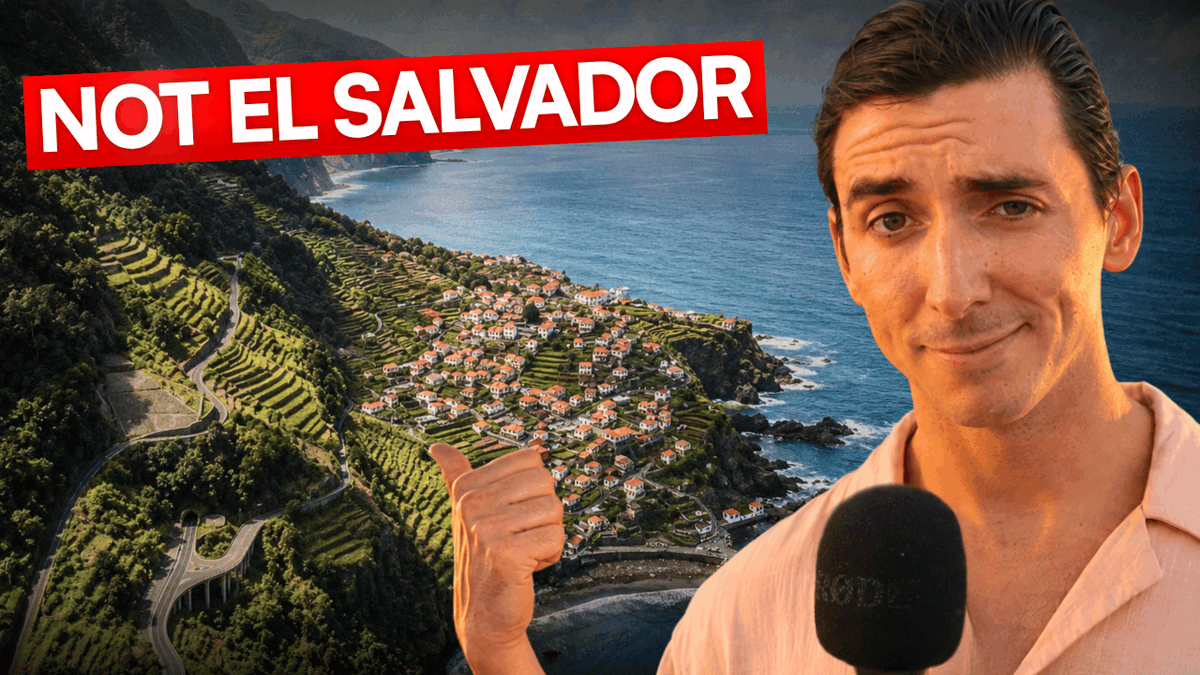 A YouTube-style thumbnail showing a man pointing to a coastal landscape, overlaid with red text reading 'NOT EL SALVADOR'.
