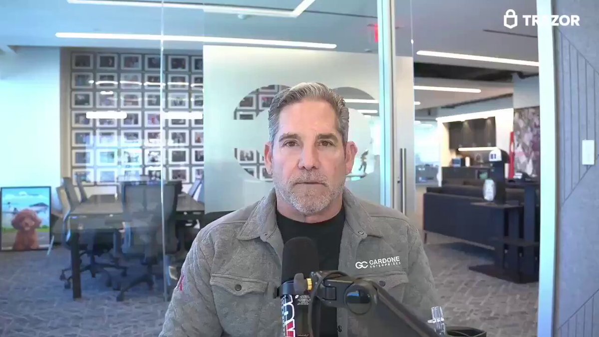 In the image, a man wearing a gray jacket and standing at an office desk appears to be having a conversation over the phone while being recorded for his show or article. The post indicates that he has made $500,000,000 worth of Bitcoin in the past year, which is quite an impressive achievement. Furthermore, he plans on investing another 10,000 Bitcoins into the market. Michael Saylor is also present in the image, adding to the significance of this event.
