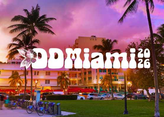 A promotional graphic for '00miami 2026' featuring a pink and purple sunset over Ocean Drive with palm trees and art deco buildings.