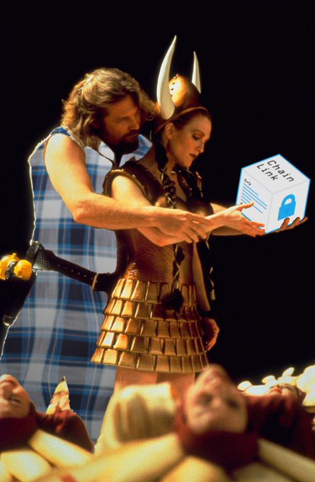 A man and woman in Viking-style costumes holding a cube labeled 'ChainLINK' with a padlock icon.