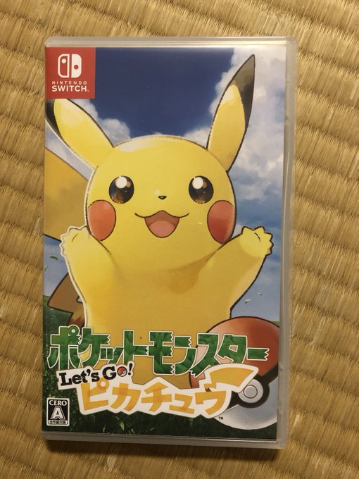 The image shows a Nintendo Switch game case for "Pokémon: Let's Go, Pikachu!" (ポケットモンスター Let's Go! ピクチュウ) in Japanese, featuring a smiling Pikachu on the cover against a blue sky background.

This connects to the post about "childhood Pikachu now cashing in on the blockchain," as the beloved Pokémon franchise and its iconic mascot Pikachu have been increasingly monetized through NFT and blockchain ventures targeting nostalgic fans.