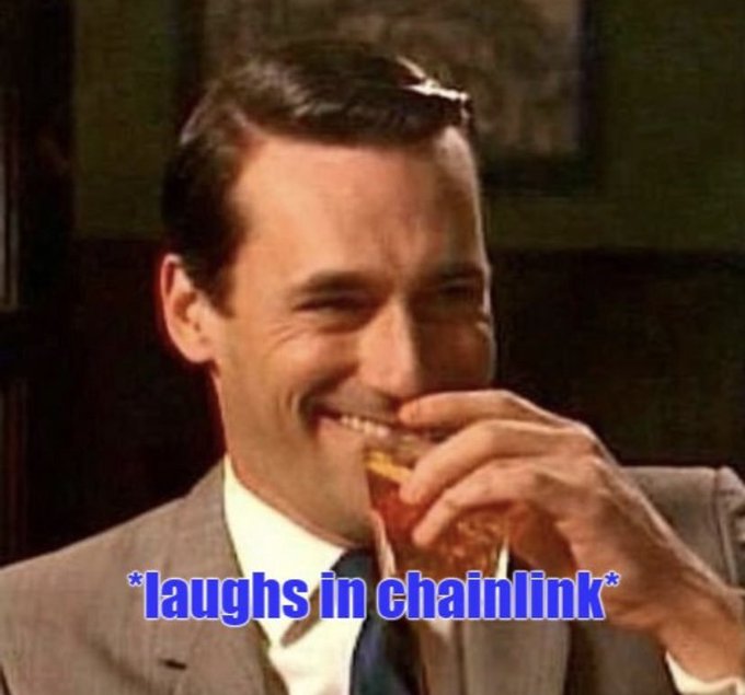 A well-dressed man in a gray suit and blue tie laughs while sipping from a glass, paired with the bold blue text "*laughs in chainlink*" — a meme referencing the post's claim that Ethereum served as a loss leader for Chainlink ($LINK), implying Link holders benefit at Ethereum's expense.