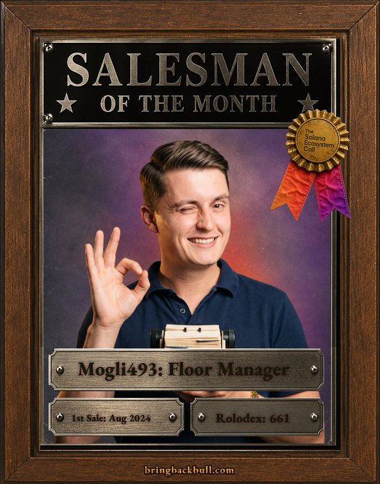 A wooden-framed "SALESMAN OF THE MONTH" award plaque featuring a smiling young man in a blue polo shirt making an "OK" hand gesture, named "Mogli493: Floor Manager" with details "1st Sale: Aug 2024" and "Rolodex: 661" from bringbackbull.com.