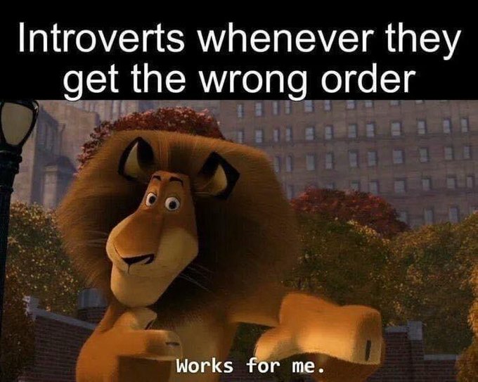 A humorous meme featuring Alex the Lion from the animated movie Madagascar, with text reading 'Introverts whenever they get the wrong order' and 'Works for me.'