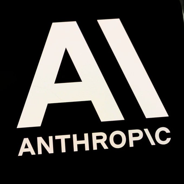 The image displays the Anthropic logo, featuring a stylized white "AI" monogram above the company name "ANTHROPIC" against a black background. This branding relates to the post announcing Anthropic's 20-year lease agreement with TeraWulf to utilize 401 MW of digital infrastructure for powering its AI models.