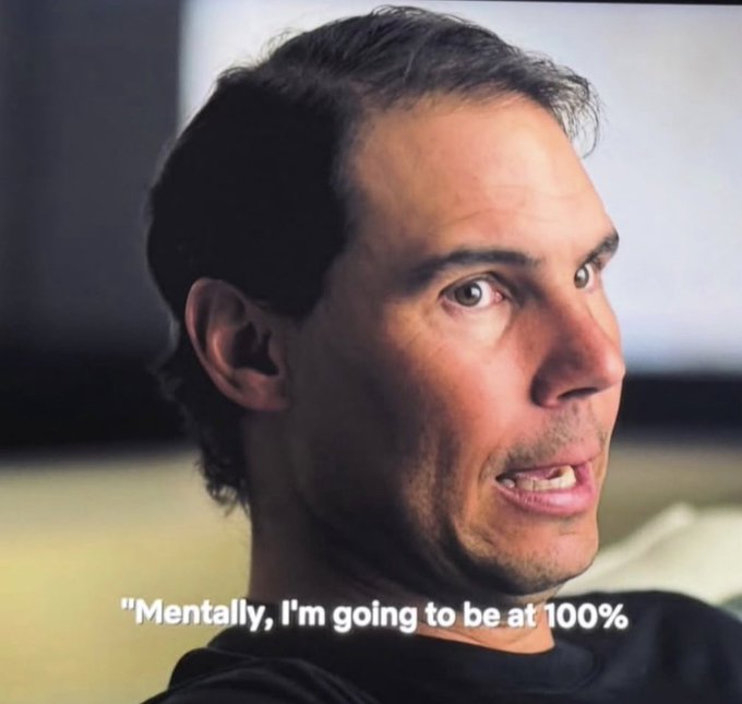 A close-up portrait of a man with dark hair looking off-camera, with the quote 'Mentally, I'm going to be at 100%' displayed at the bottom of the image.