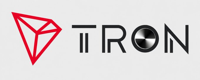 The TRON logo featuring a red geometric diamond symbol next to the word "TRON" in black text, with the 'O' styled as a metallic disc.