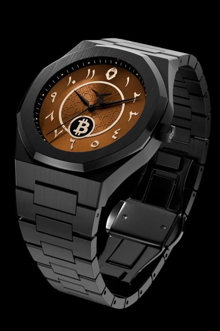 A sleek black watch with a copper-toned dial featuring the Bitcoin "B" logo and Arabic numerals is displayed against a black background, showcasing the Falcon Edition's Swiss movement and CVSwissLink™ interface as a tribute to Bitcoin's 21 million coin supply.