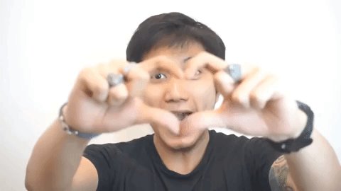 The image shows a man making an odd, face shape with his hands and showing teeth. He appears happy or excited while wearing a black t-shirt. The caption gives information about Bitcoin and its protection against quantum attacks using native post-quantum wallets provided by Arch Network.