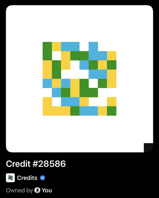 A digital collectible/NFT displayed as a pixelated mosaic pattern in green, yellow, and blue squares, labeled 'Credit #28586' and 'Owned by You' on a dark background.