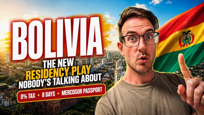 The image features a man wearing glasses, pointing at a picture of a flag with the words "Bolivia" written above it. The background shows an aerial view of a city skyline, indicating that this photo was taken from a high vantage point. The caption below the image provides information about the post's content and its relation to the flag.